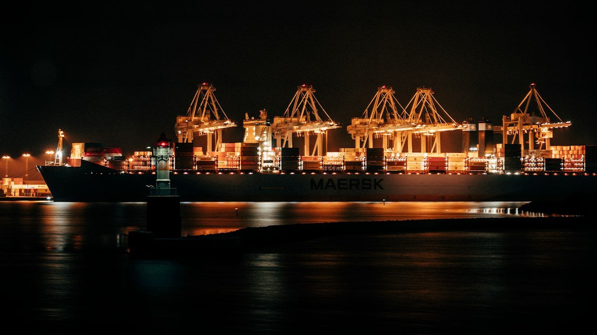 Container port lit up at night