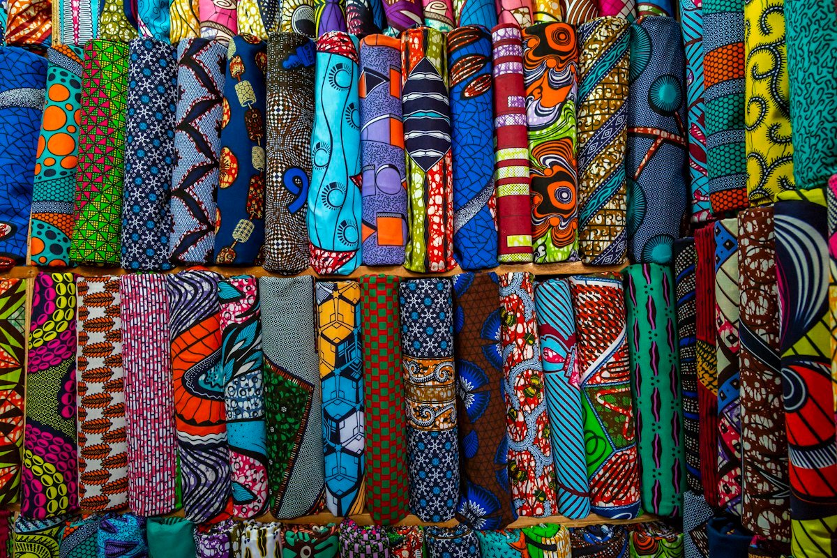 Rolls of colourful wax print fabric